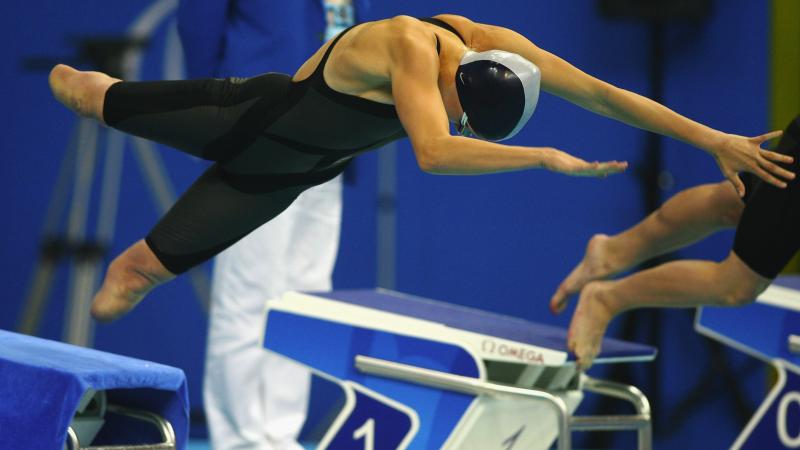 Jessica Long of the U.S.A competes in the Women's 50m Freestyle - S8 A picture of a girl jumping into a pool