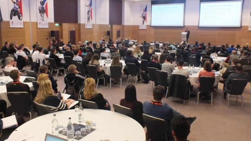 UK Paralympic Sport Science and Sport Medicine Conference 2015 Room with stage and tables around it