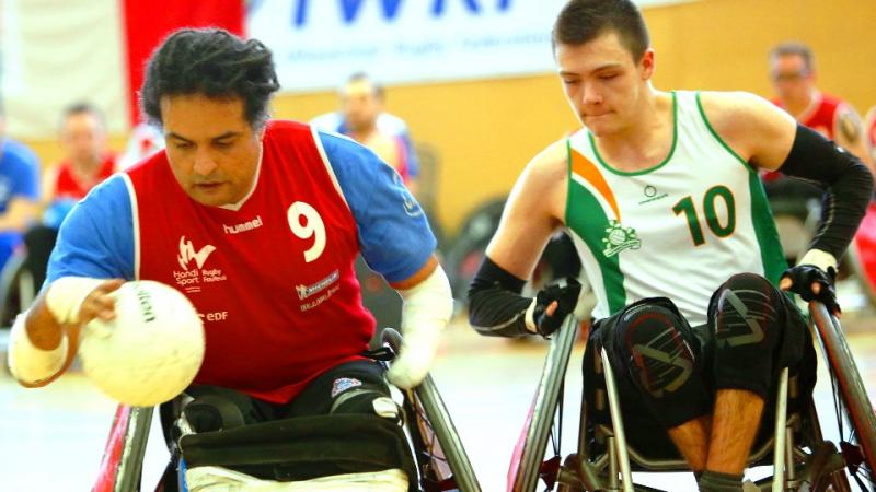 Ireland's Thomas Moylan (10) challenges France's Ryadh Sallem (9) during the IWRF Europe Division B final. 