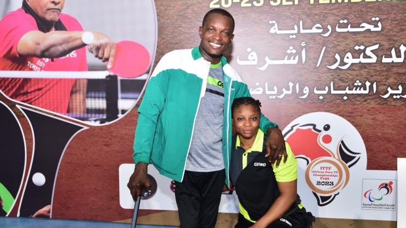 Husband and wife, Kayode and Christiana Alabi are posing for a photo